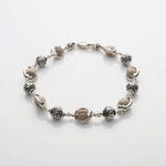 Tulsi Capping With Om Silver Bead Bracelet