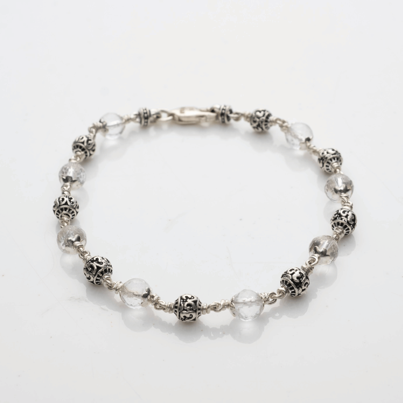 5-6 mm Sphatik Diamond Cut Beads With Om Silver Beads Bracelet