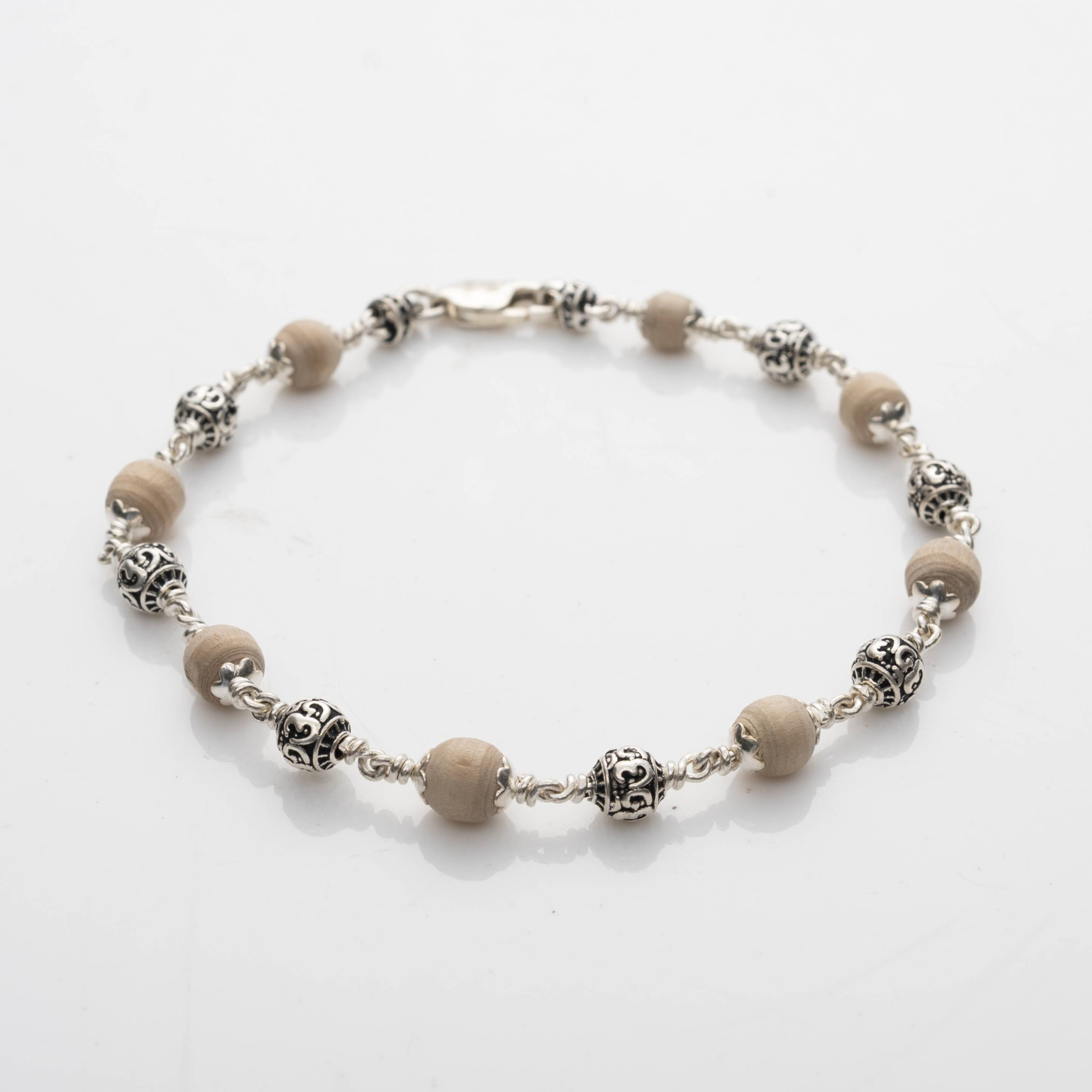 5-6  MM Tulsi With Silver Om Beads Bracelet