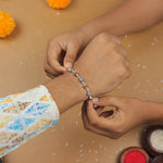 Authentic Silver Rakhi with Rudraksha and Om Beads