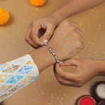 Authentic Silver Rakhi with Om Beads Capping and Rudraksha Bracelet