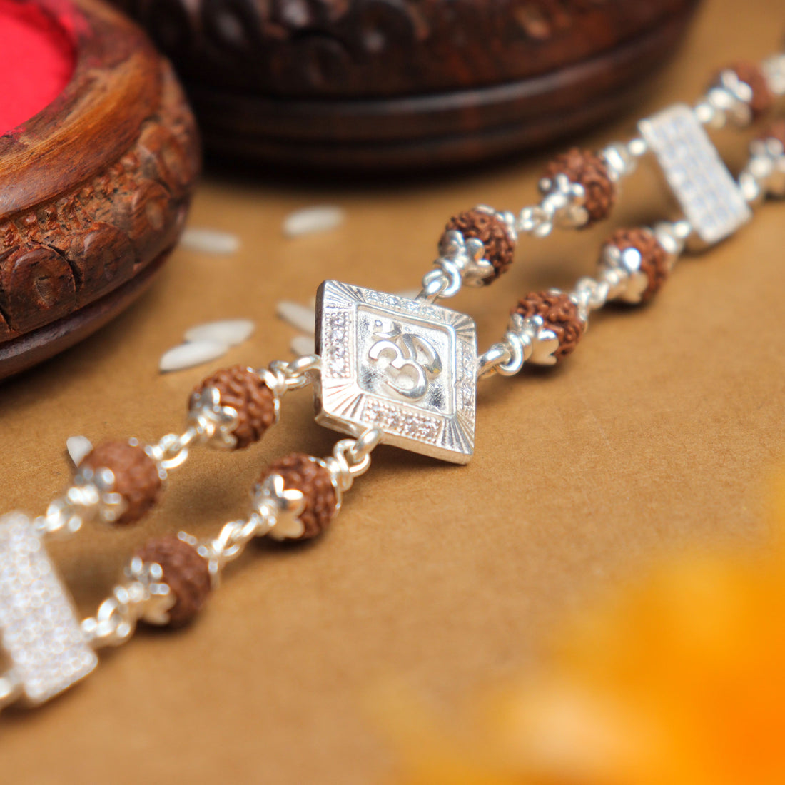 Pure Silver Rakhi with Rudraksha, Om Brooch, Double Line Bracelet