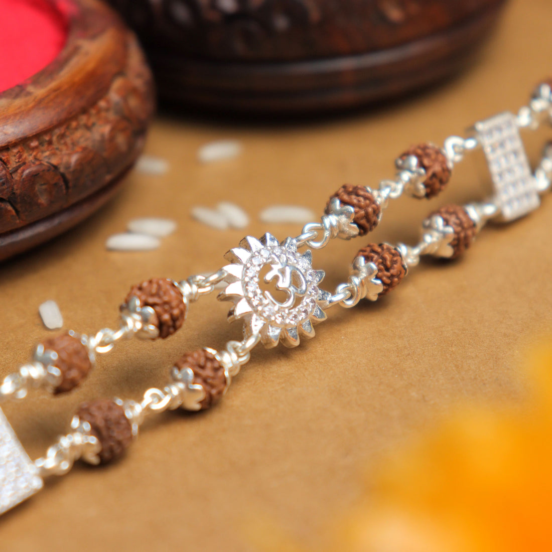 Pure Silver Rakhi with Rudraksha, Om Flower Brooch, Double Line Bracelet
