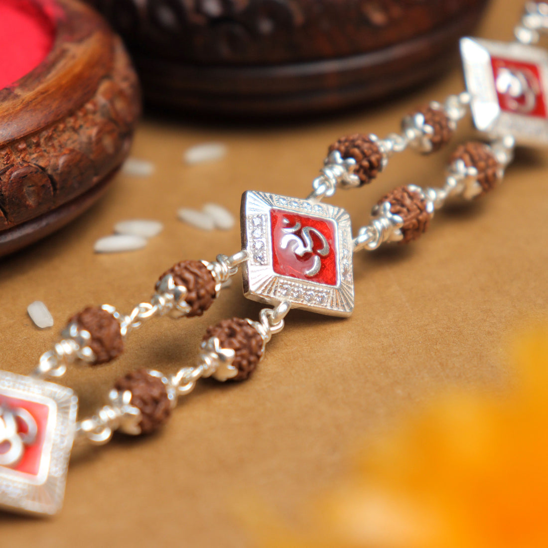 Pure Silver Rakhi with Rudraksha, Om, and Three Rhombus Brooches, Double Line Design