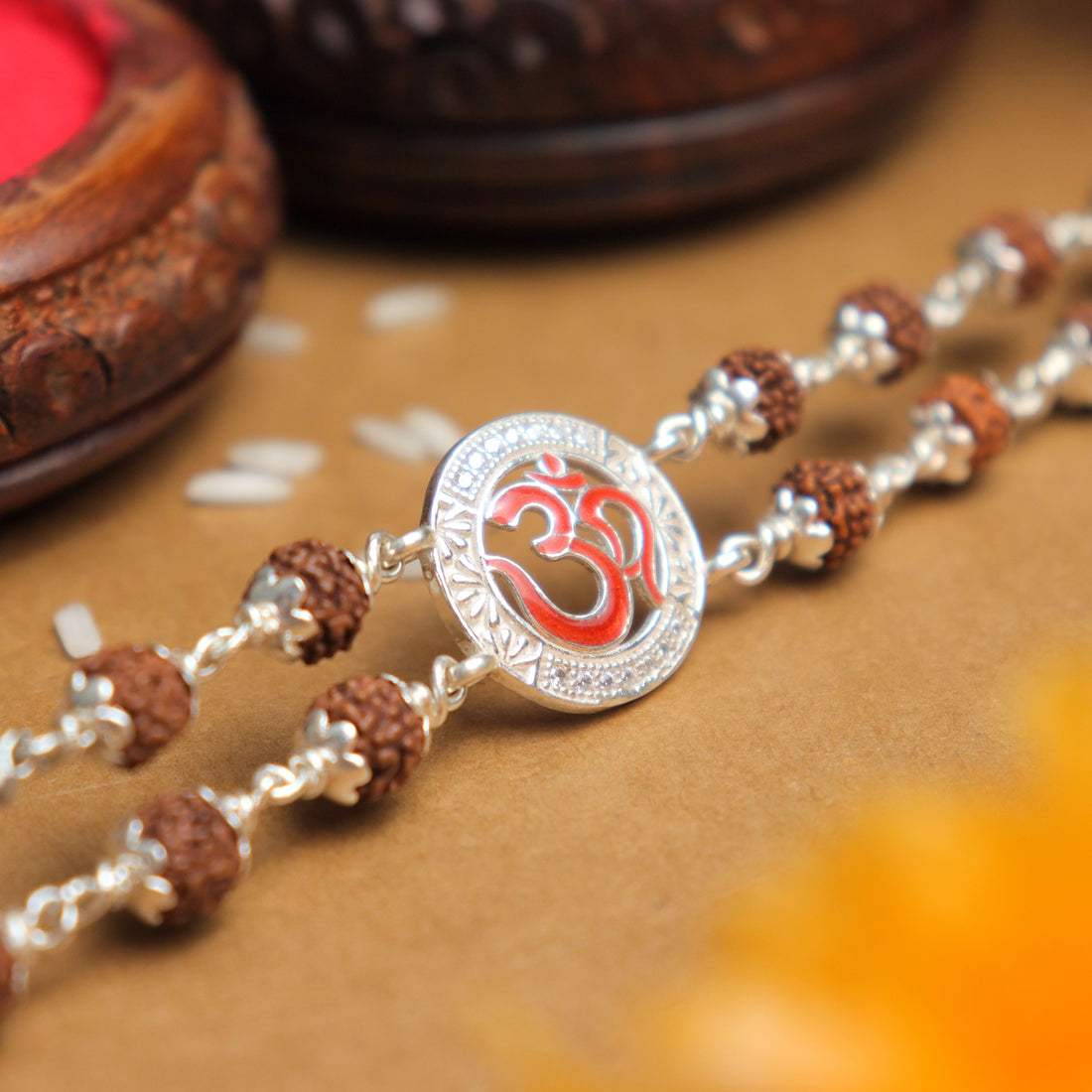Pure Silver Rakhi with Rudraksha, Om in Round Shape, Double Line Bracelet