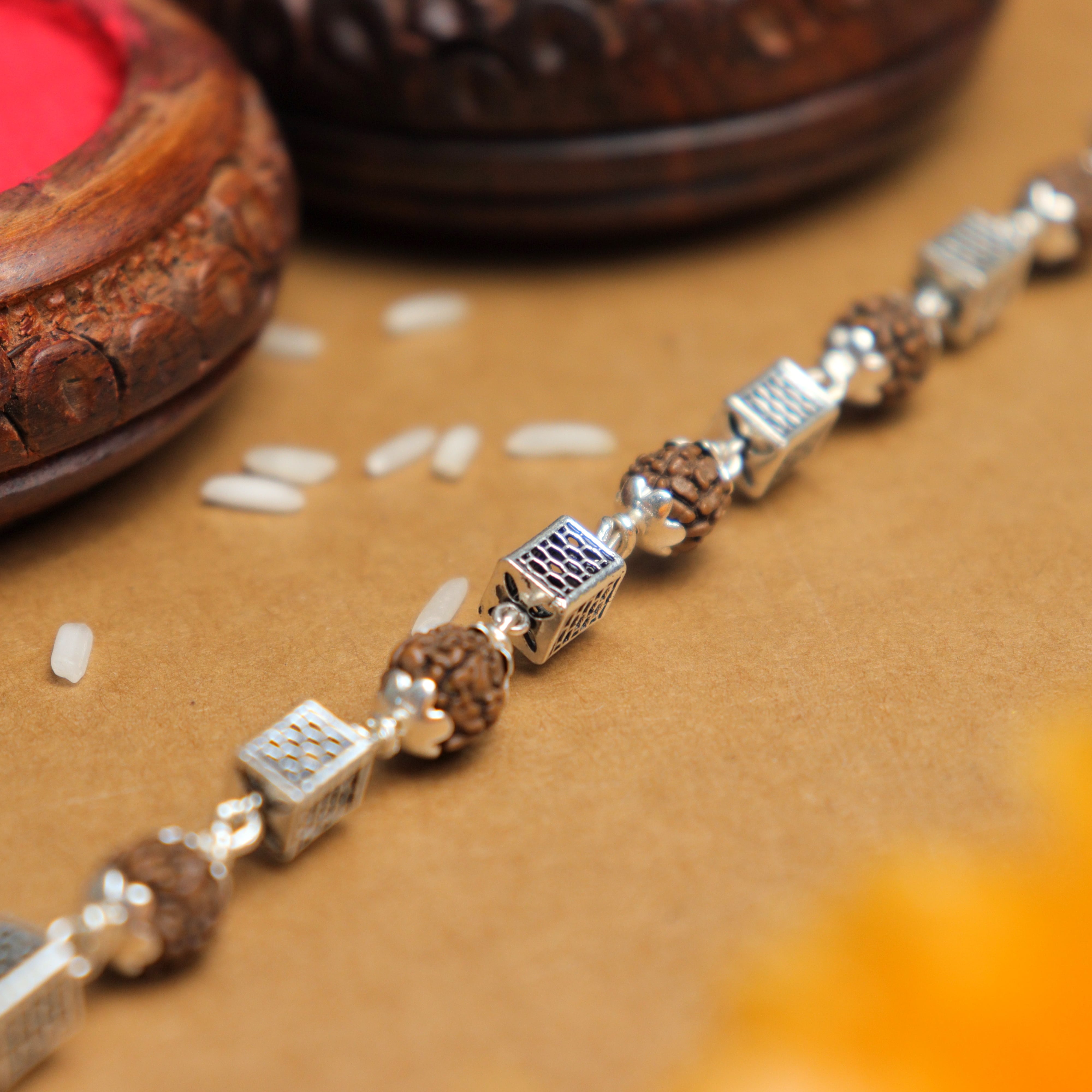 Pure Silver Rakhi with Square Cylinder Rudraksha Beads