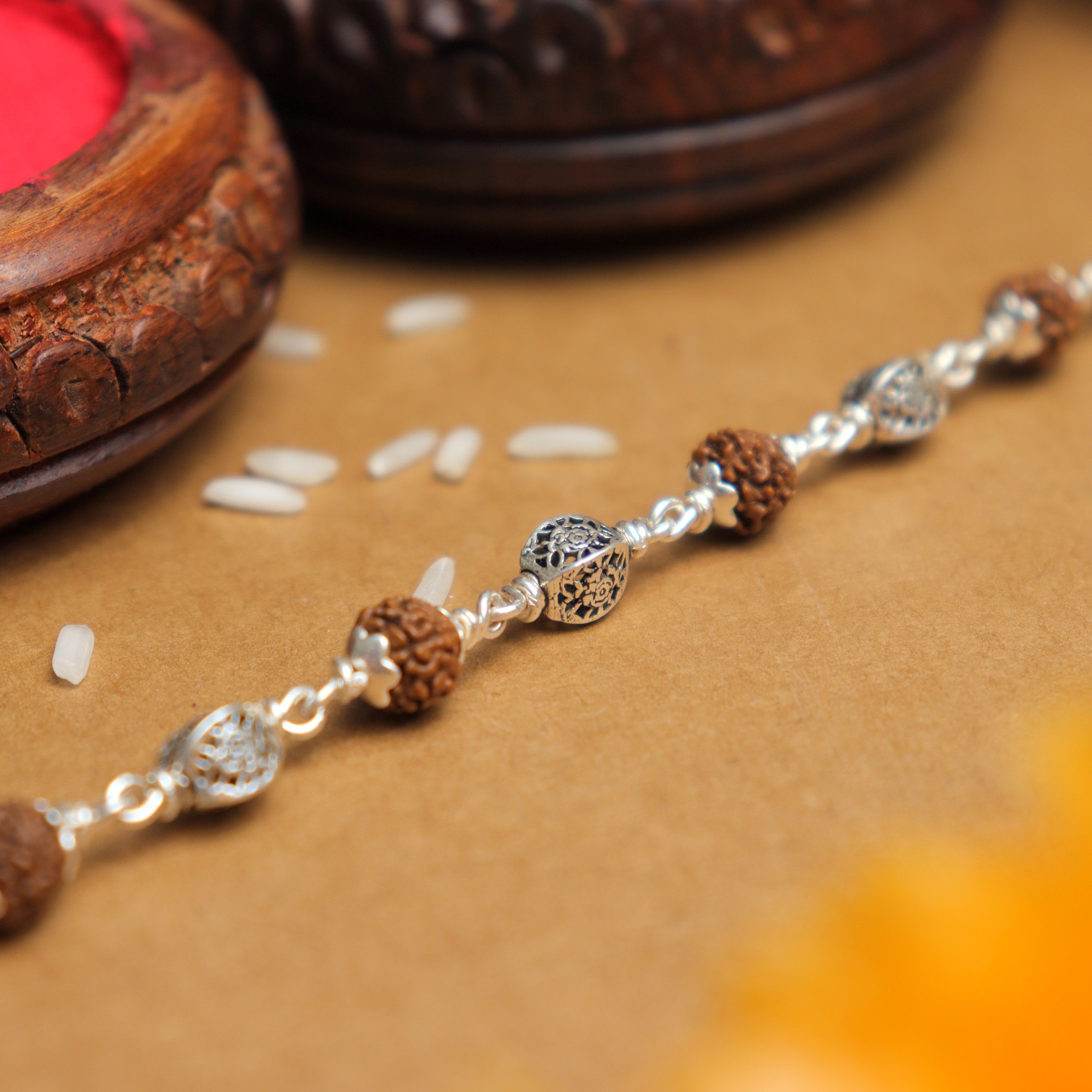 Pure Silver Rakhi with Rudraksha and Hollow Circular Beads