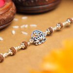 Pure Silver Rakhi with Om and Lotus Flower and Single Line Rudraksha for Men