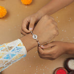 Authentic Silver Rakhi with Om in a Concave Sphere and Single Line Rudraksha