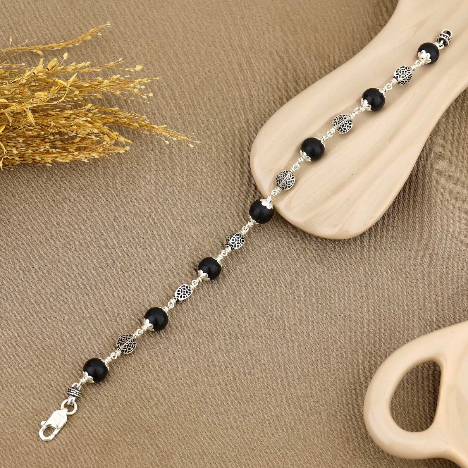Karungali with Hollow Circular Silver Bracelet