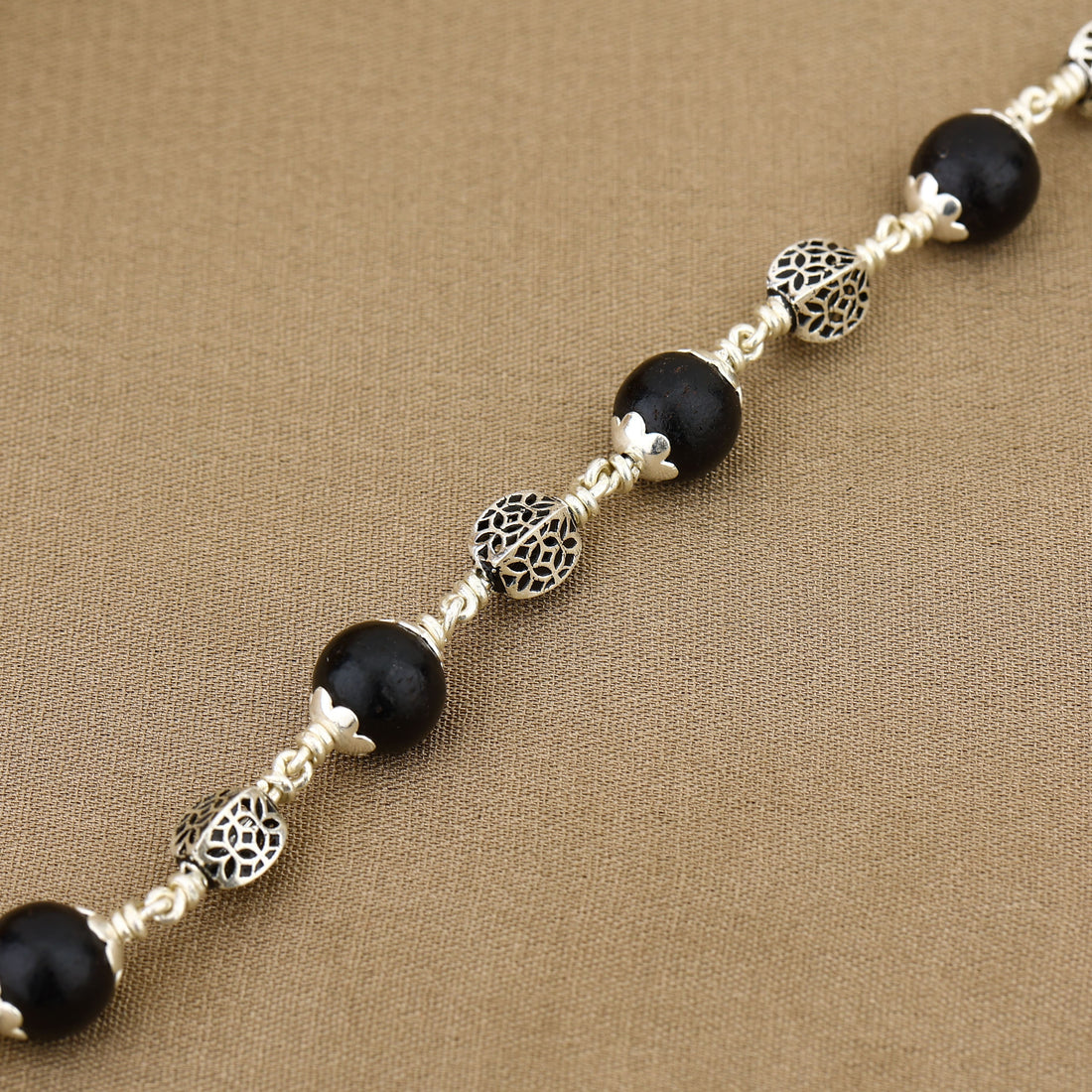 Karungali with Hollow Circular Silver Bracelet
