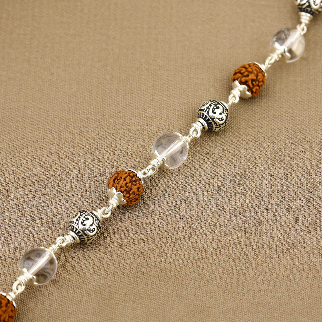 Rudraksha with Sphatik Diamond Cut and Om Silver Beads Bracelet