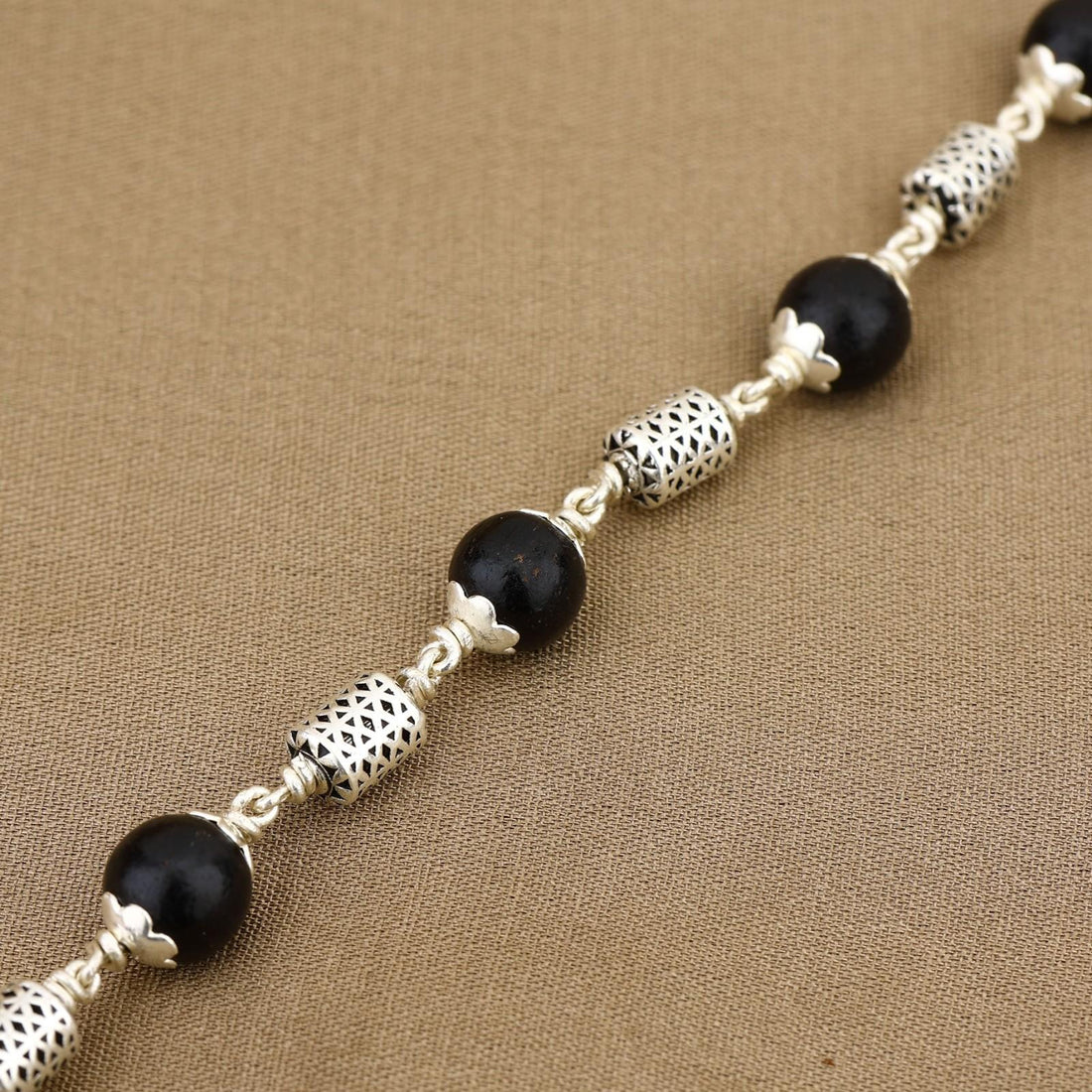 Karungali with Oval Filigree Beads Silver Bracelet