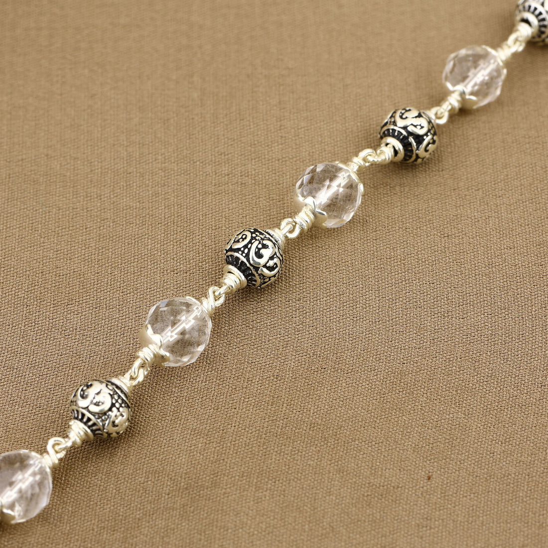 Sphatik Diamond Cut Beads With Om Silver Beads Bracelet
