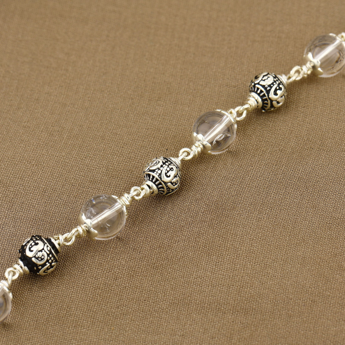 Sphatik with Om Silver Beads Bracelet