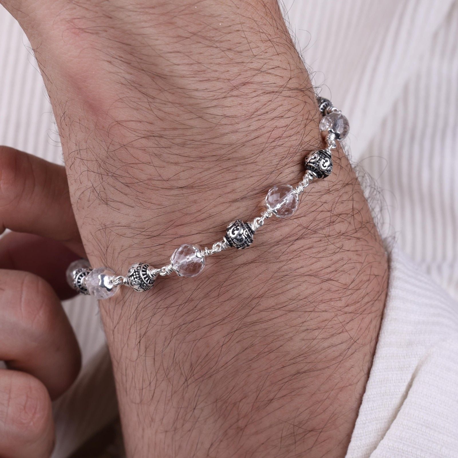 Sphatik Diamond Cut Beads With Om Silver Beads Bracelet